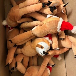 Holiday Christmas Sloth Plush Toys with Santa Hats and Velcro hands. 12 count